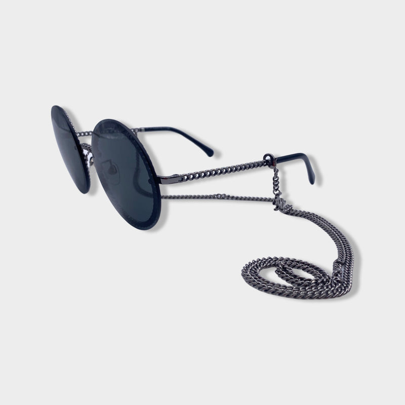 CHANEL black and silver sunglasses on a chain