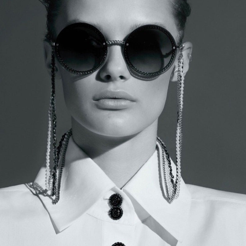 CHANEL black and silver sunglasses on a chain
