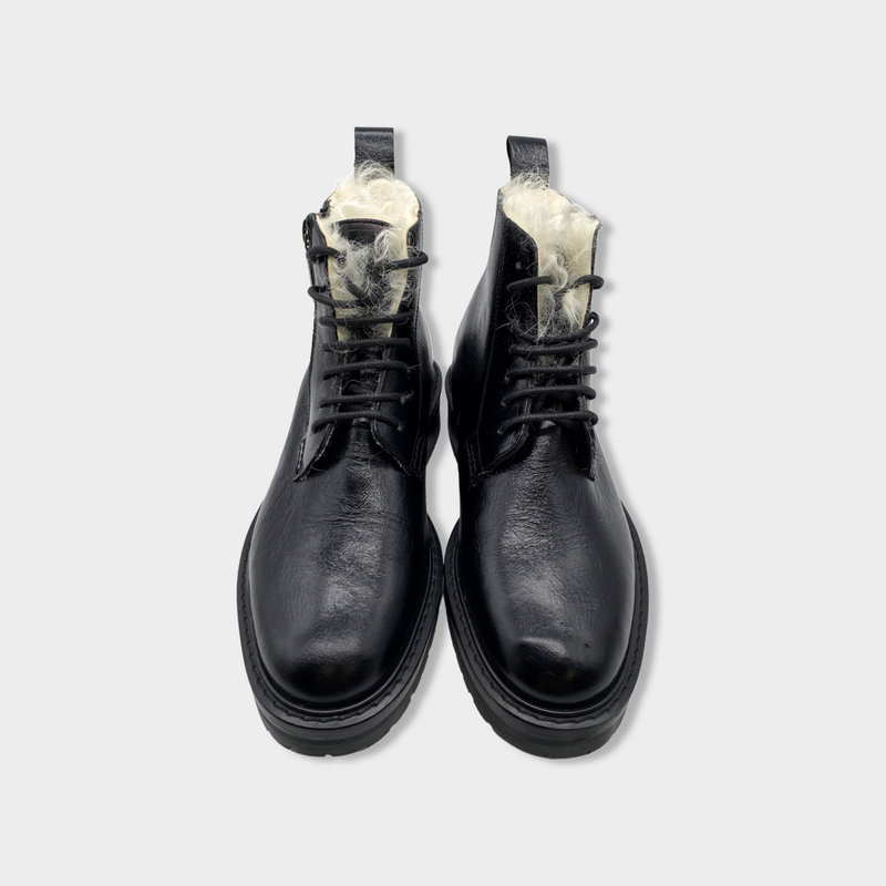 pre-loved SAINT LAURENT black leather ankle boots with fur