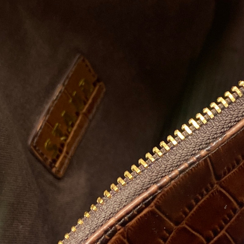 STAUD brown PVC vegan leather handbag