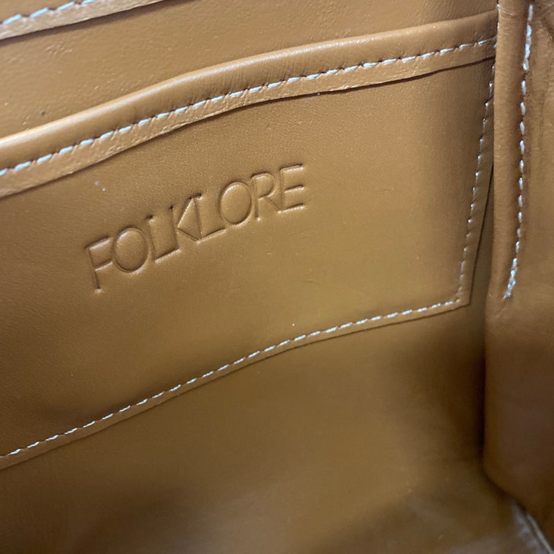 FOLKLORE yellow and brown leather small bag