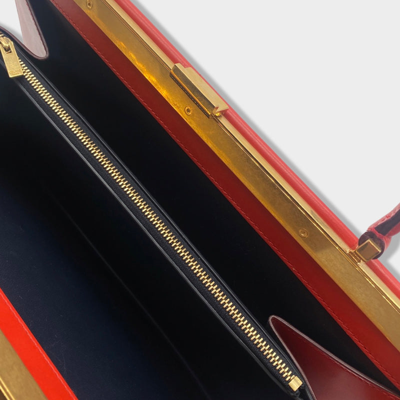 CÉLINE orange-red leather handbag clasp with gold hardware