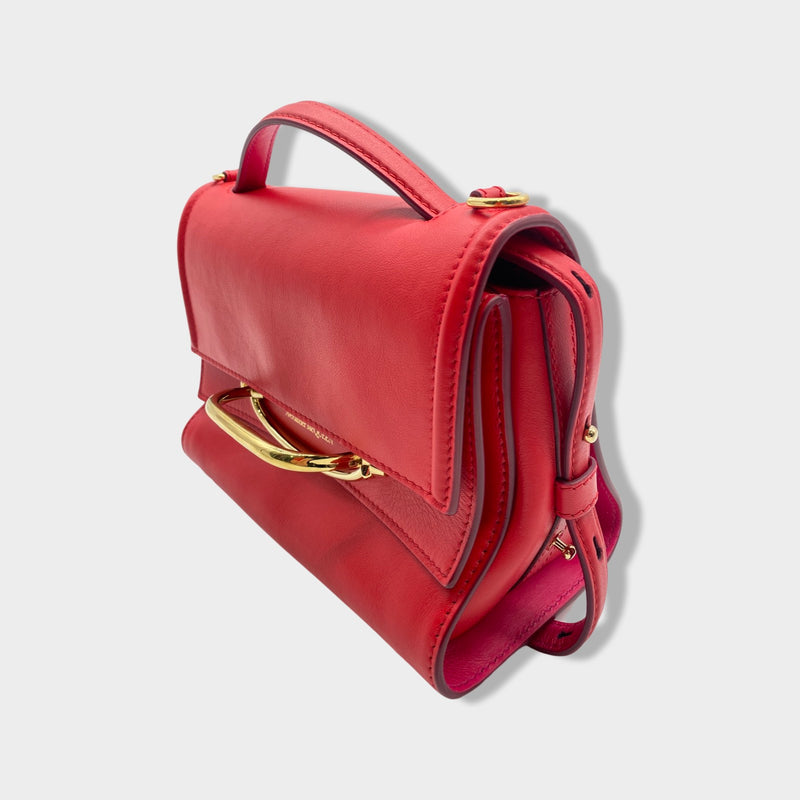 ALEXANDER MCQUEEN red leather belted handbag with gold hardware