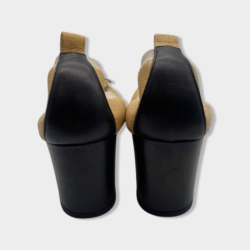 CHANEL beige and black Camellia pumps
