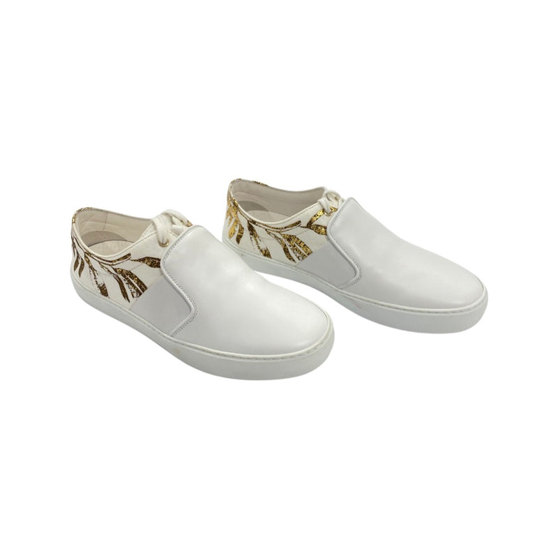 pre-owned CHANEL white and gold leather trainers | Size 38.5