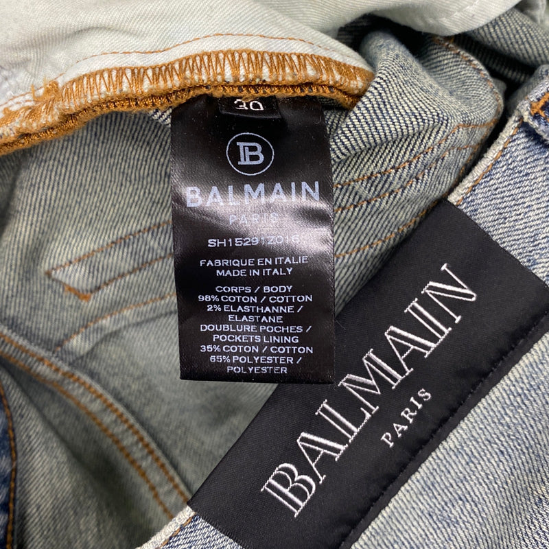 BALMAIN blue and beige ripped jeans