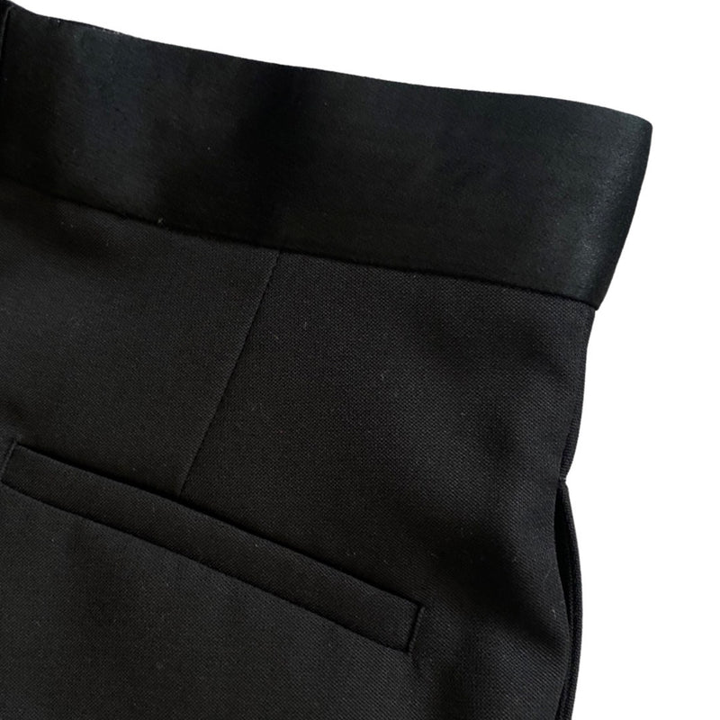 haider ackermann black woolen high-waisted trousers with silk waistband