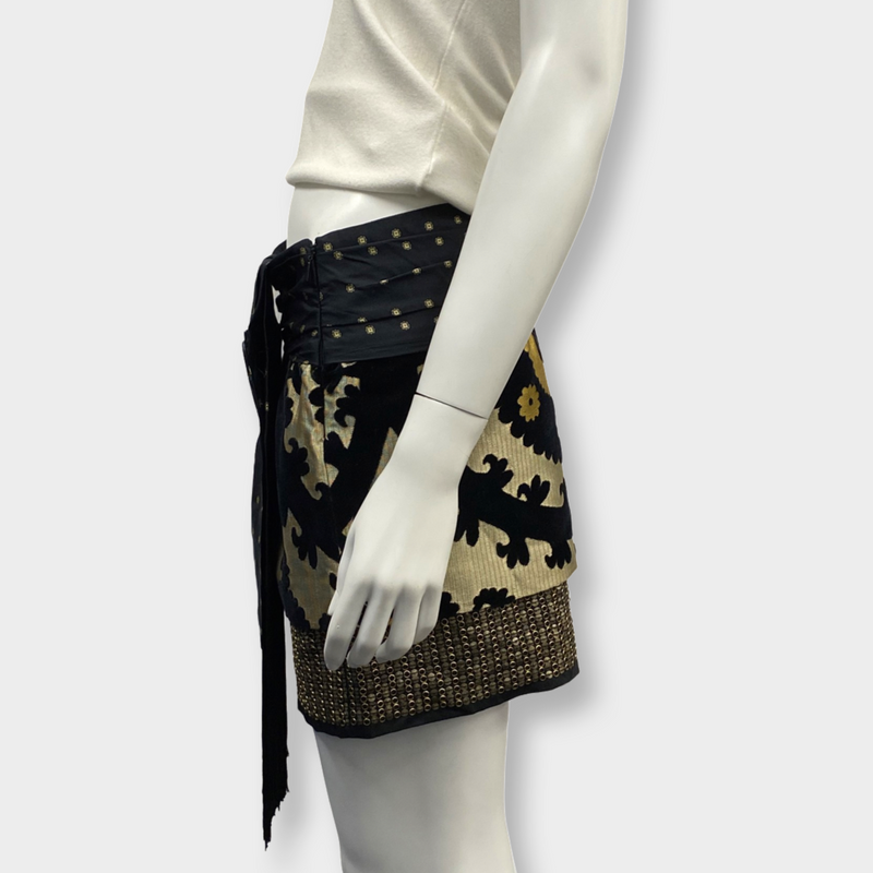 Gucci multi-pattern mini skirt with emblem badge