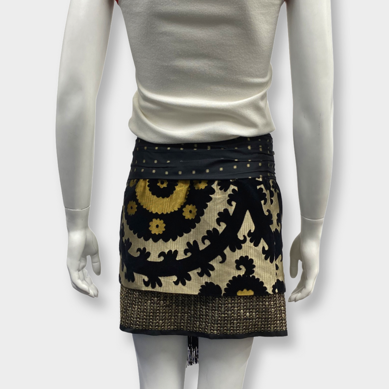 Gucci multi-pattern mini skirt with emblem badge