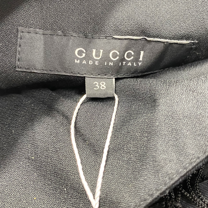 Gucci multi-pattern mini skirt with emblem badge