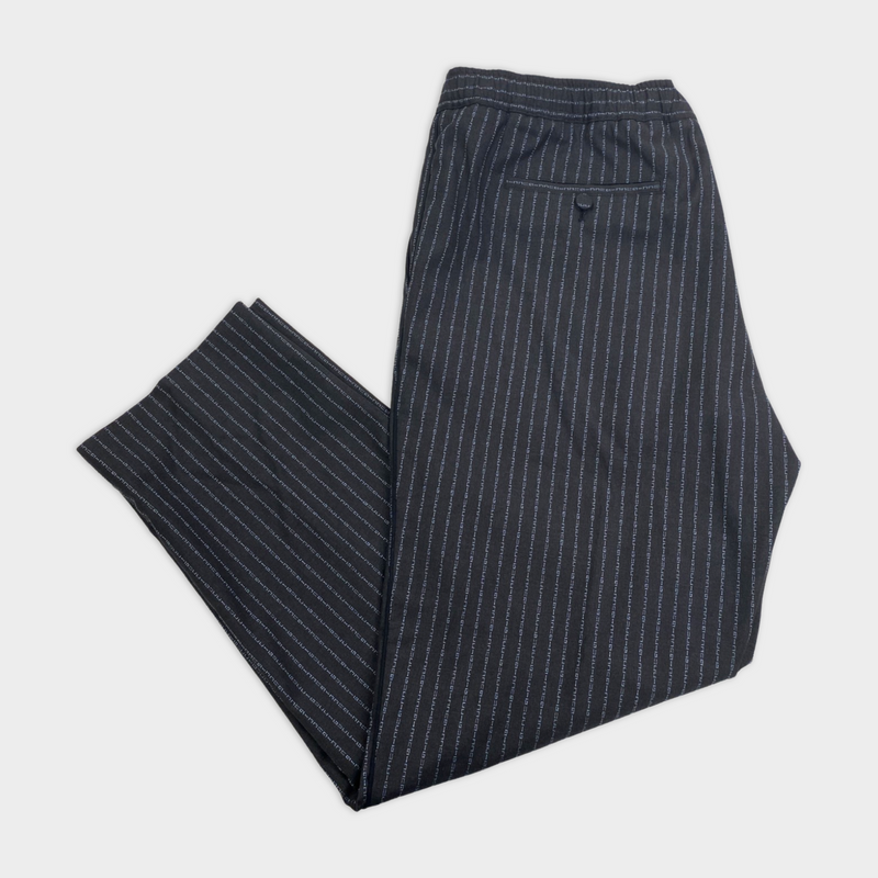pre-worn Gucci word stripe pattern trousers