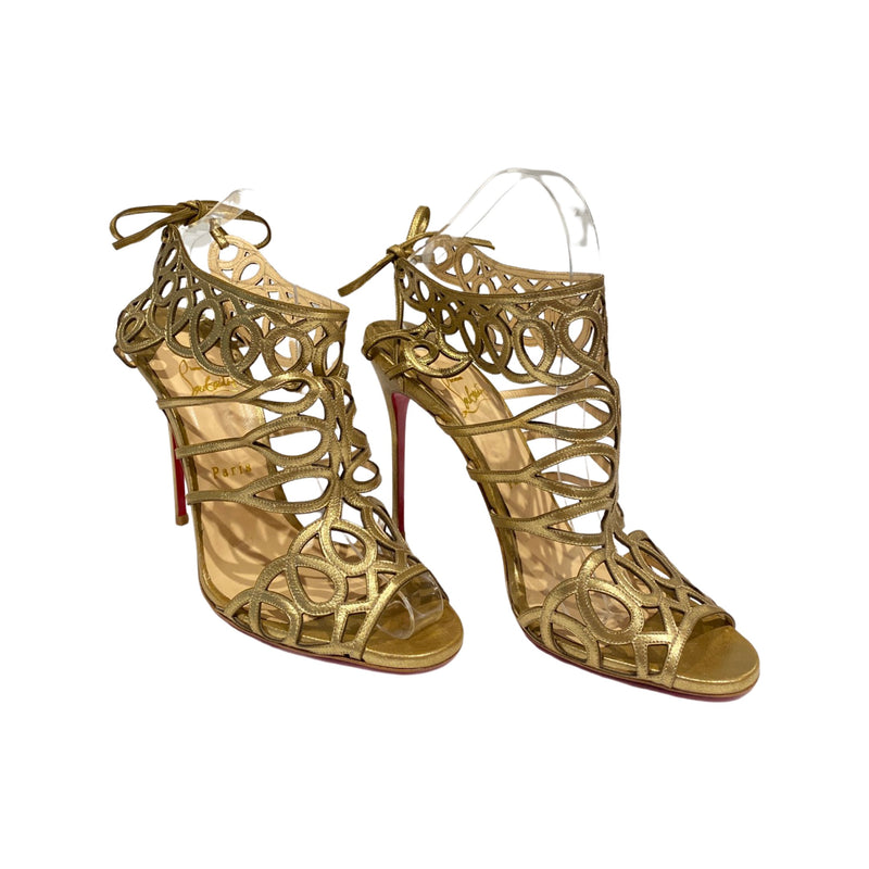 pre-loved CHRISTIAN LOUBOUTIN gold sandal heels | Size 40.5