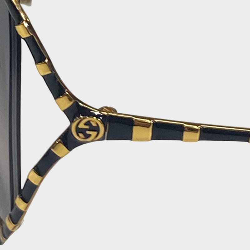 Gucci Women's Black and Gold Trim Sunglasses