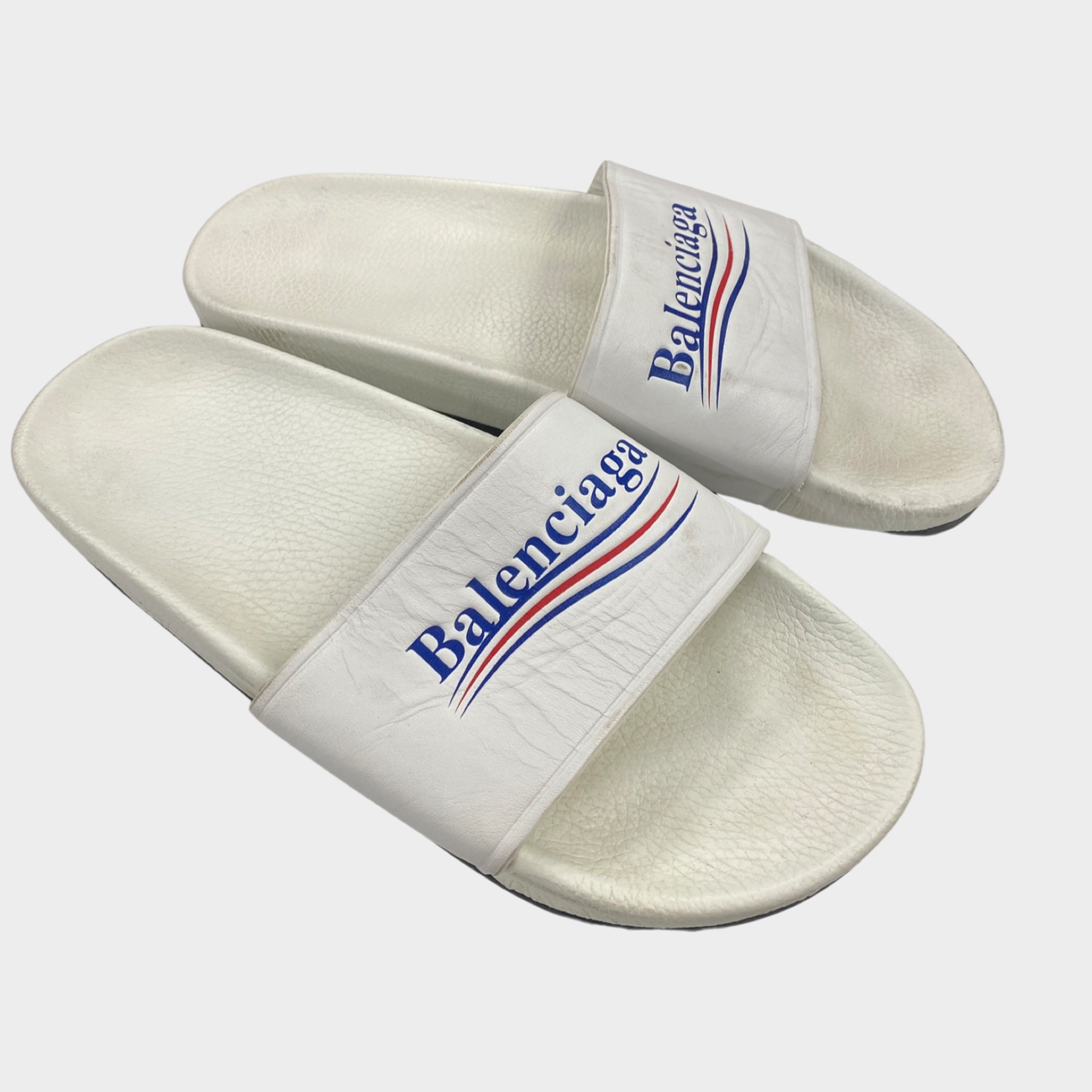 Balenciaga men's white logo rubber slides – Loop Generation