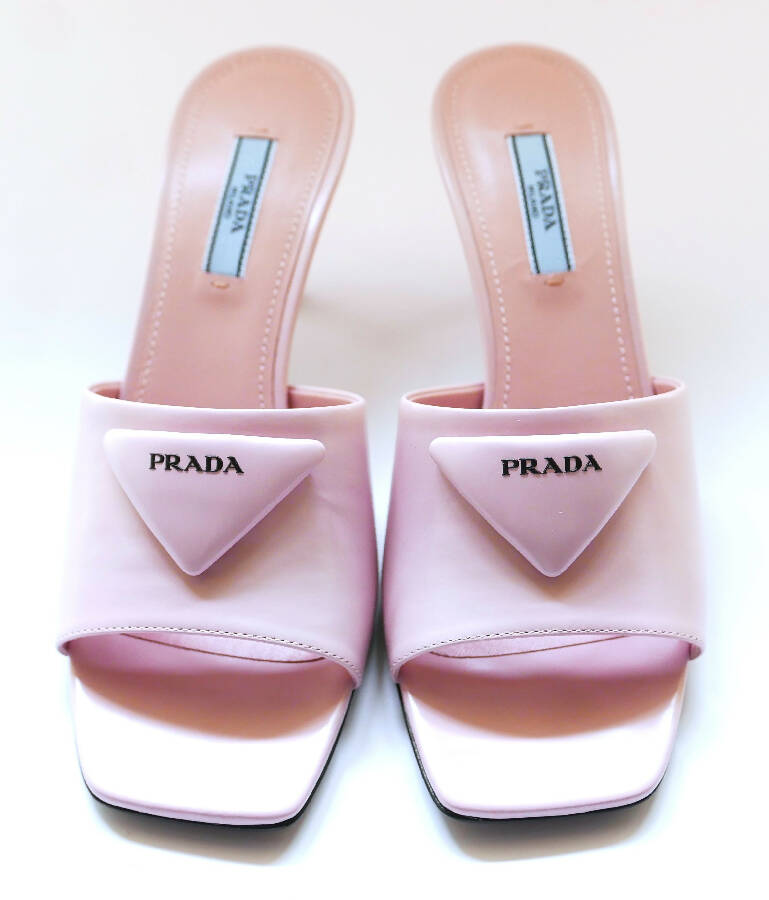 Prada women's light pink leather Triangle Logo heeled Mules