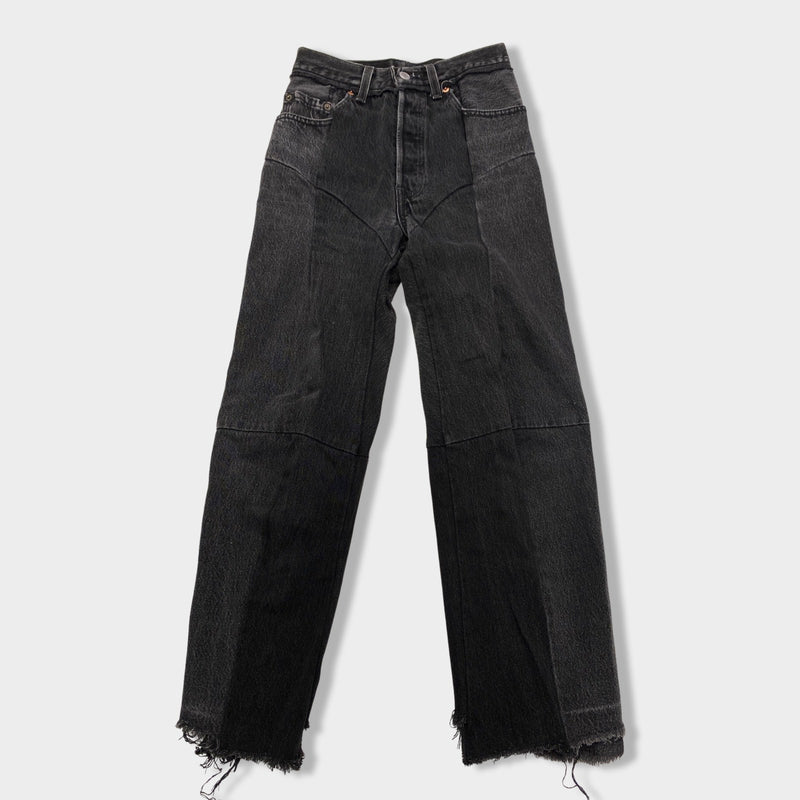 pre-owned VETEMENTS black asymmetrical jeans | Size XS