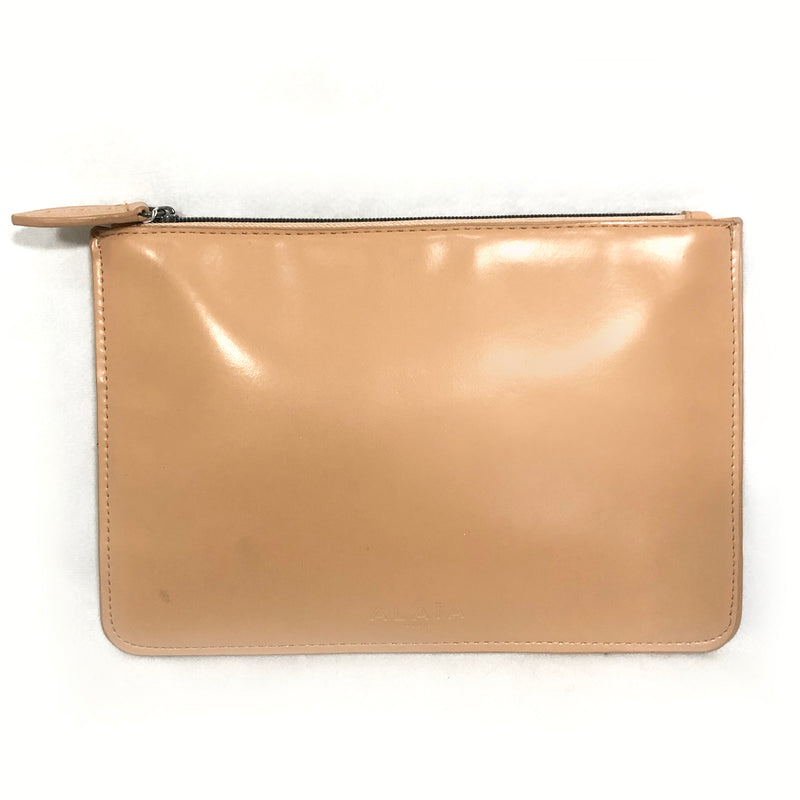 ALAÏA nude leather pouch 