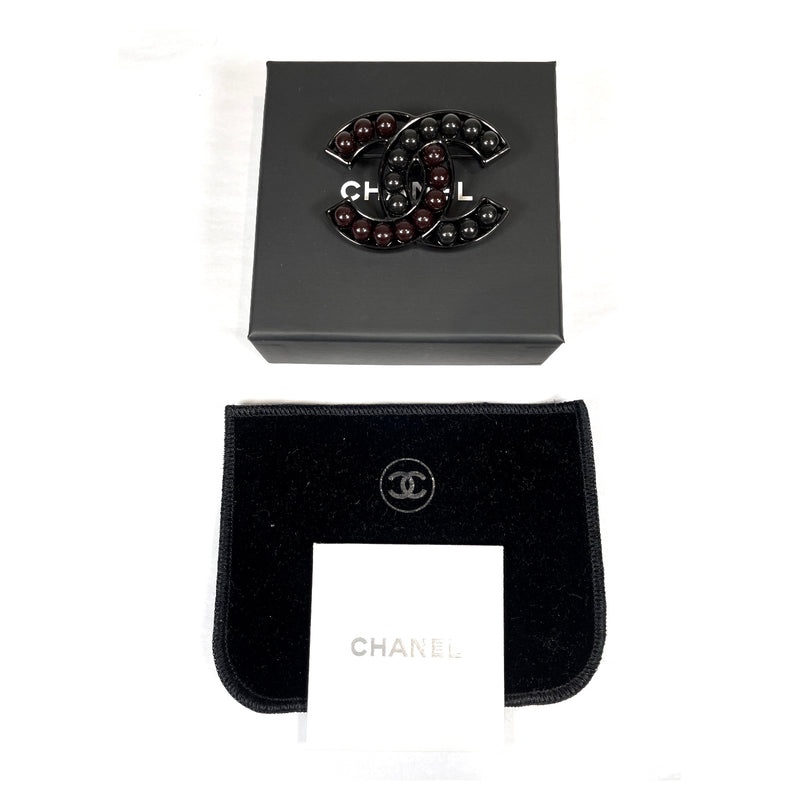 Chanel CC brown and black pearl brooch