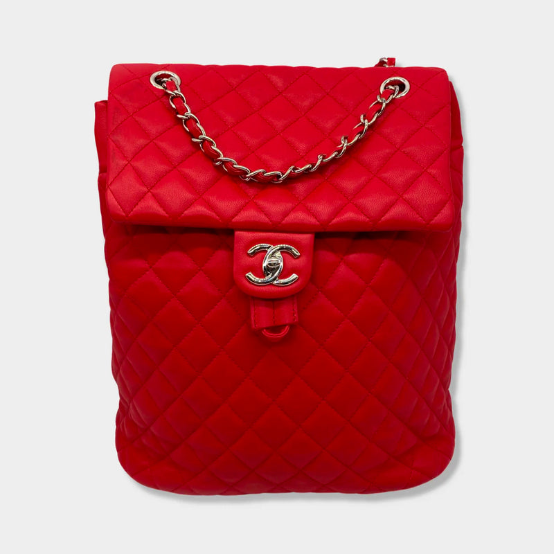 CHANEL bright red grained leather drawstring backpack with metal hardware
