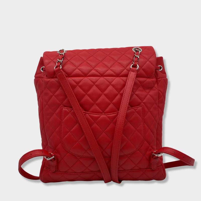 CHANEL bright red grained leather drawstring backpack with metal hardware