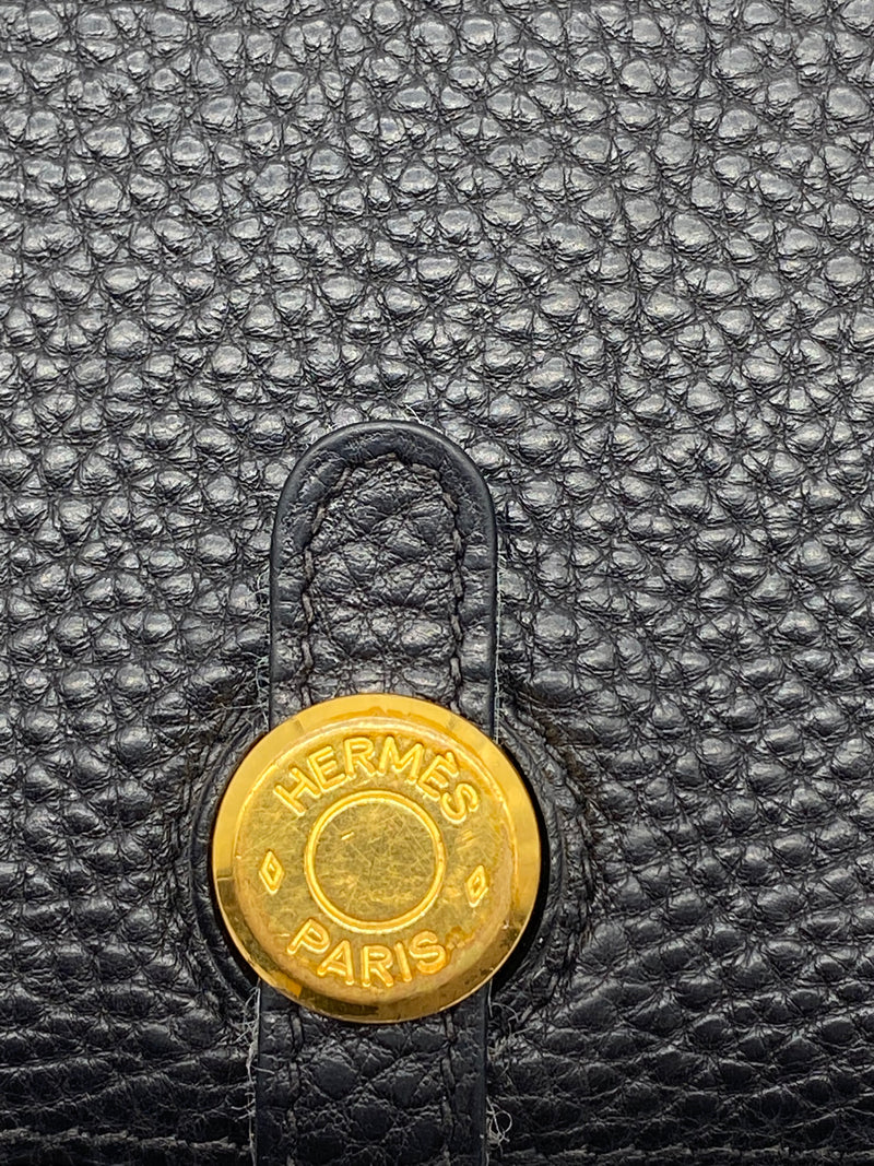 Hermés pre-loved leather wallet