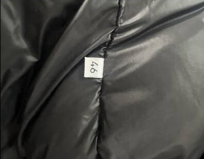 C.P Company men's black nylon down puffer jacket with hood and goggles