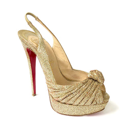 CHRISTIAN LOUBOUTIN gold glitter platform heels