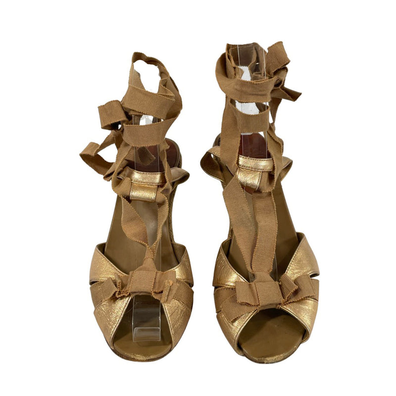 pre-owned CHRISTIAN LOUBOUTIN bronze glitter wedges | Size 36