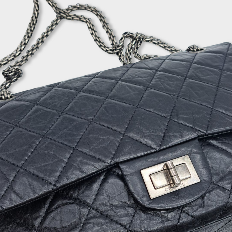 pre-loved CHANEL black leather handbag