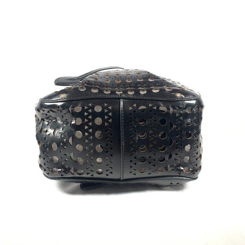 pre-loved ALAÏA black leather laser cut basket handbag with an inside mirror