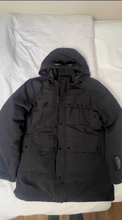 C.P Company men's black nylon down puffer jacket with hood and goggles