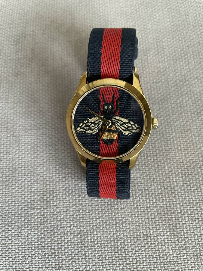 Gucci women’s red and navy canvas G-timeless bee watch