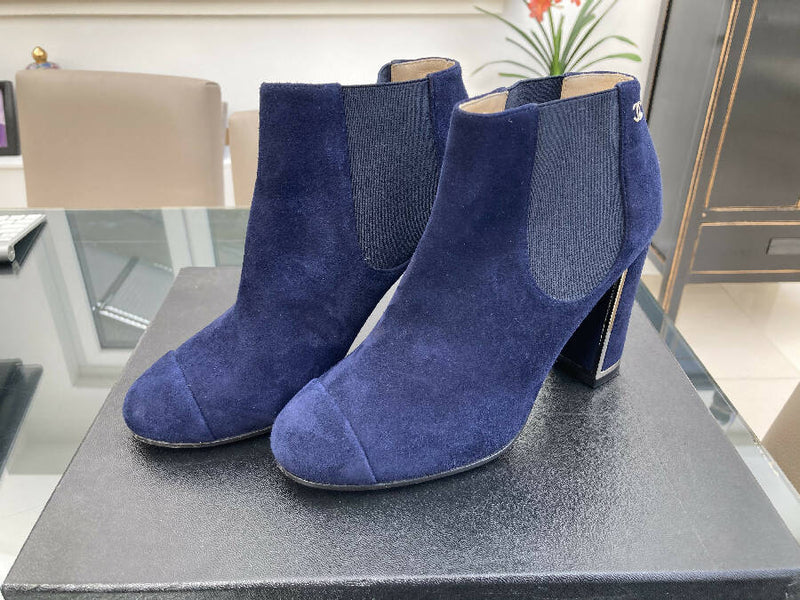 Chanel women’s navy suede block-heels ankle boots