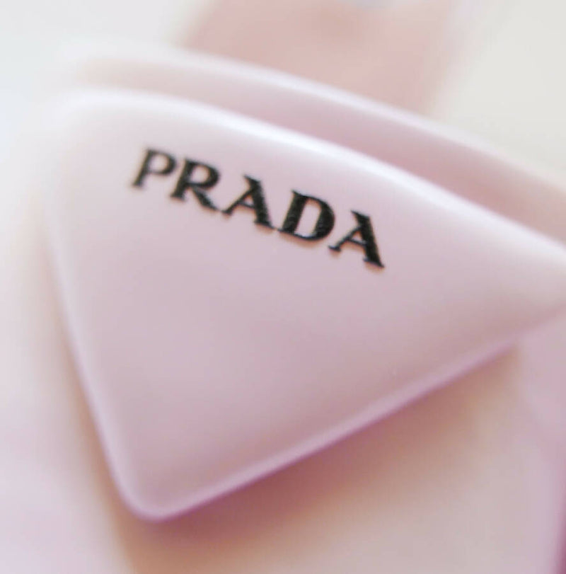 Prada women's light pink leather Triangle Logo heeled Mules